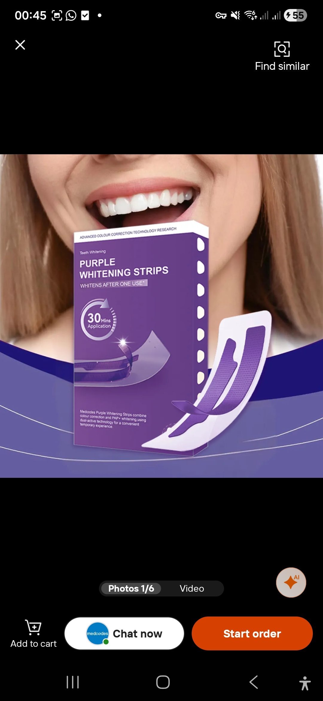 Whitening strips and their packaging laid out on a clean surface